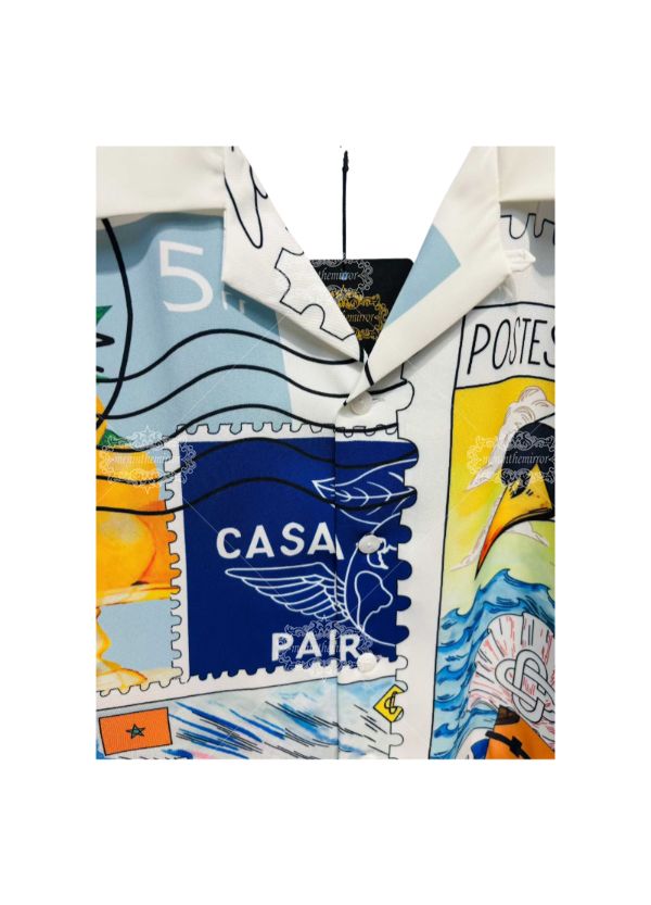 वाइब्रेंट एक्वा ब्लू जियोमेट्रिक प्रिंट शर्ट | हाई-कंट्रास्ट लक्स स्ट्रीटवियर